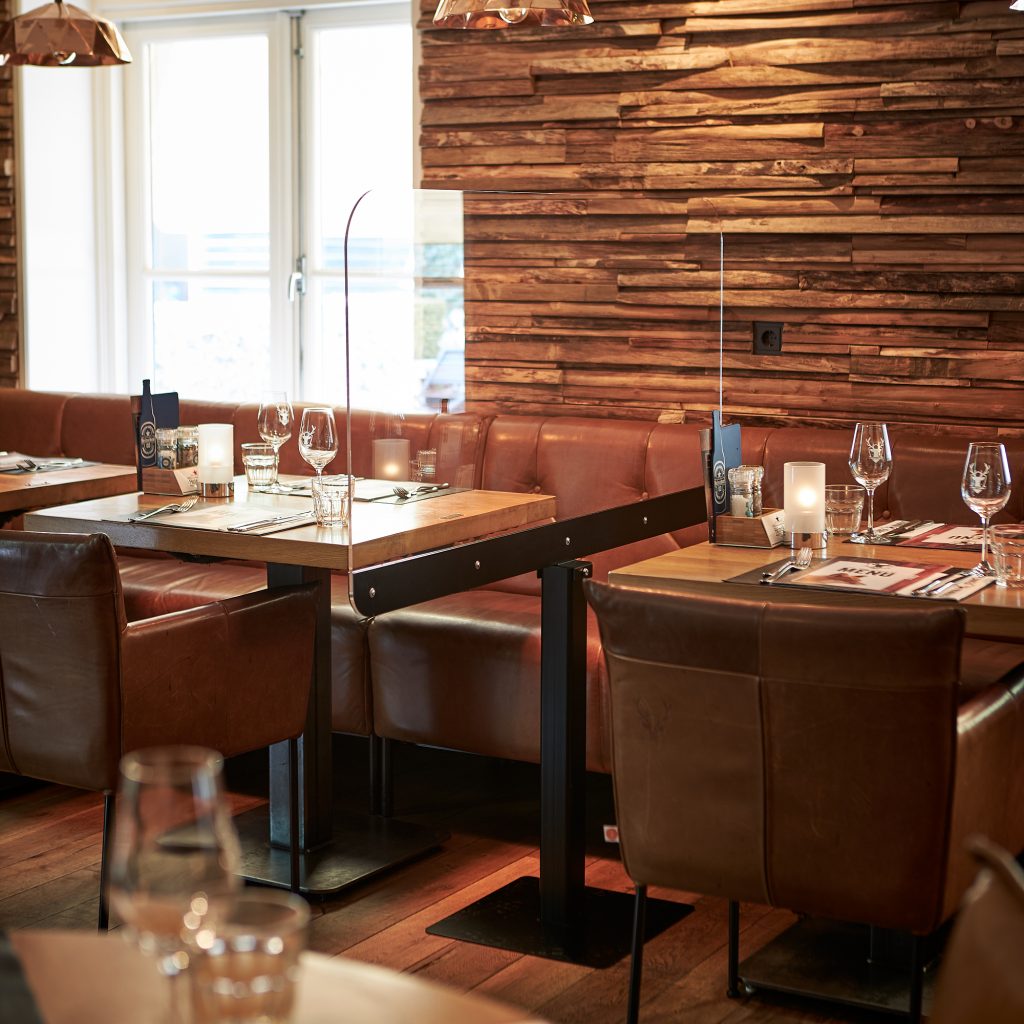 Perspex screen on a base in catering establishment
